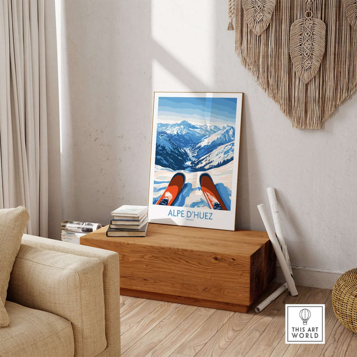 Alpe d'Huez winter sports art print displayed in a cozy living room setting with wooden decor.