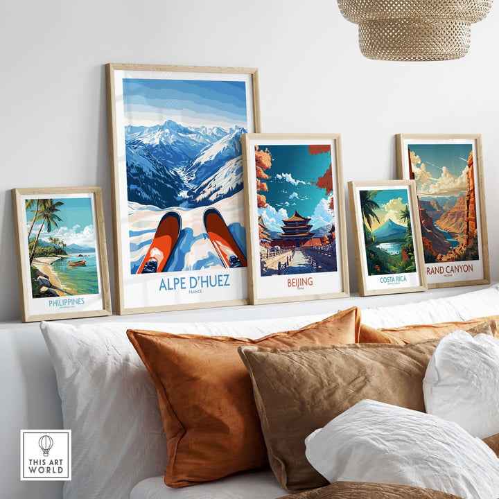 Alpe d'Huez art print featuring winter sports, displayed with other travel-themed prints in a cozy living room setting.