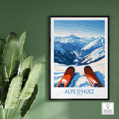 Alpe d'Huez winter sports art print featuring snowy mountains and ski equipment in a stylish frame.