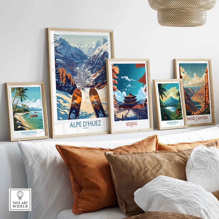 Alpe d'Huez ski poster among other travel-themed art prints in a cozy interior setting.