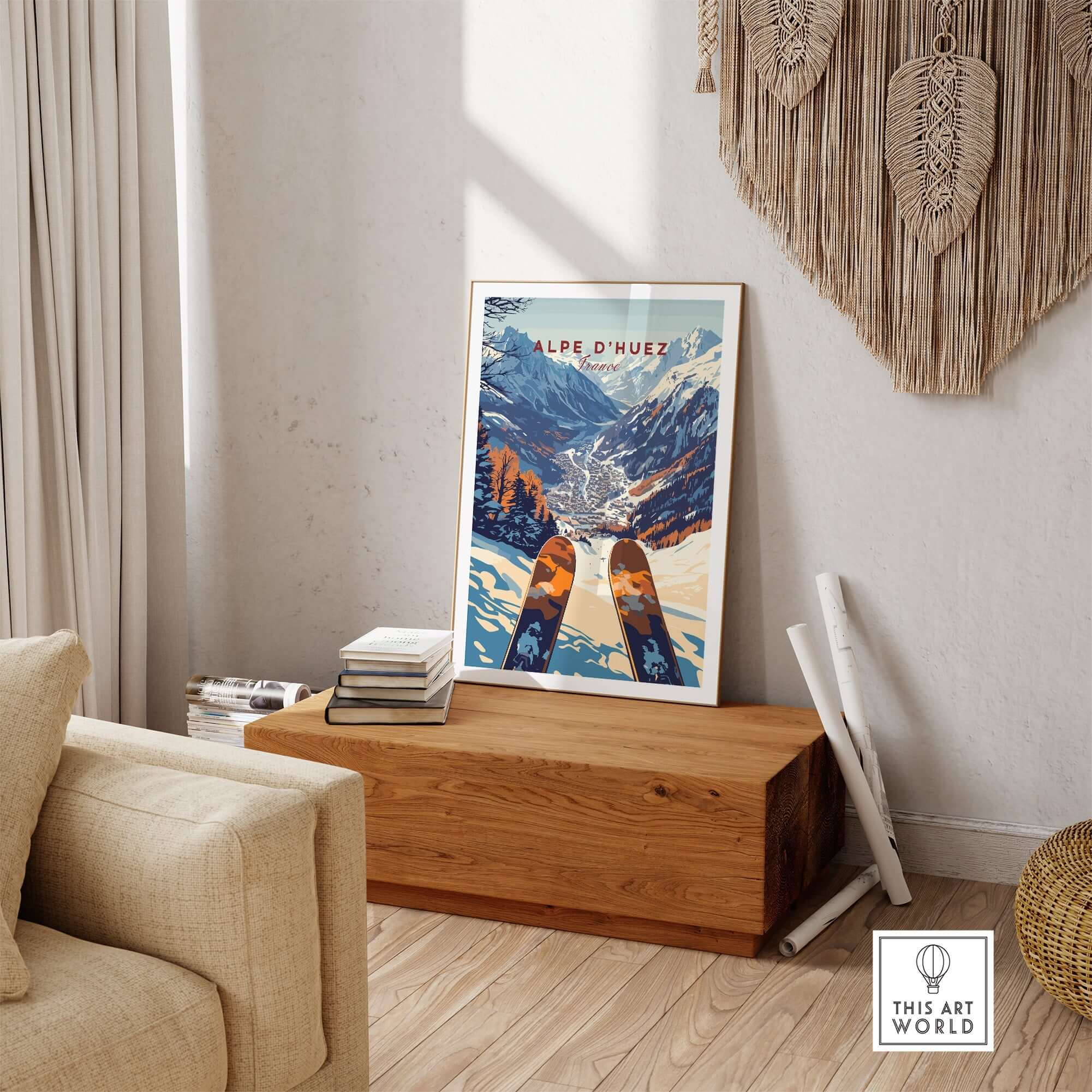 Alpe d'Huez Ski Print framed on a wooden table in a cozy living room, showcasing the beauty of the French Alps.