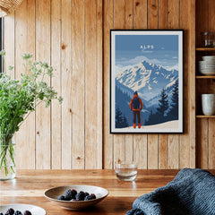 Alps Travel Poster - France featuring stunning mountainous landscapes and a hiker in a cozy home setting.