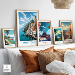 Amalfi Coast poster in a modern interior, showcasing travel prints from Italy, Philippines, Beijing, and the Grand Canyon.