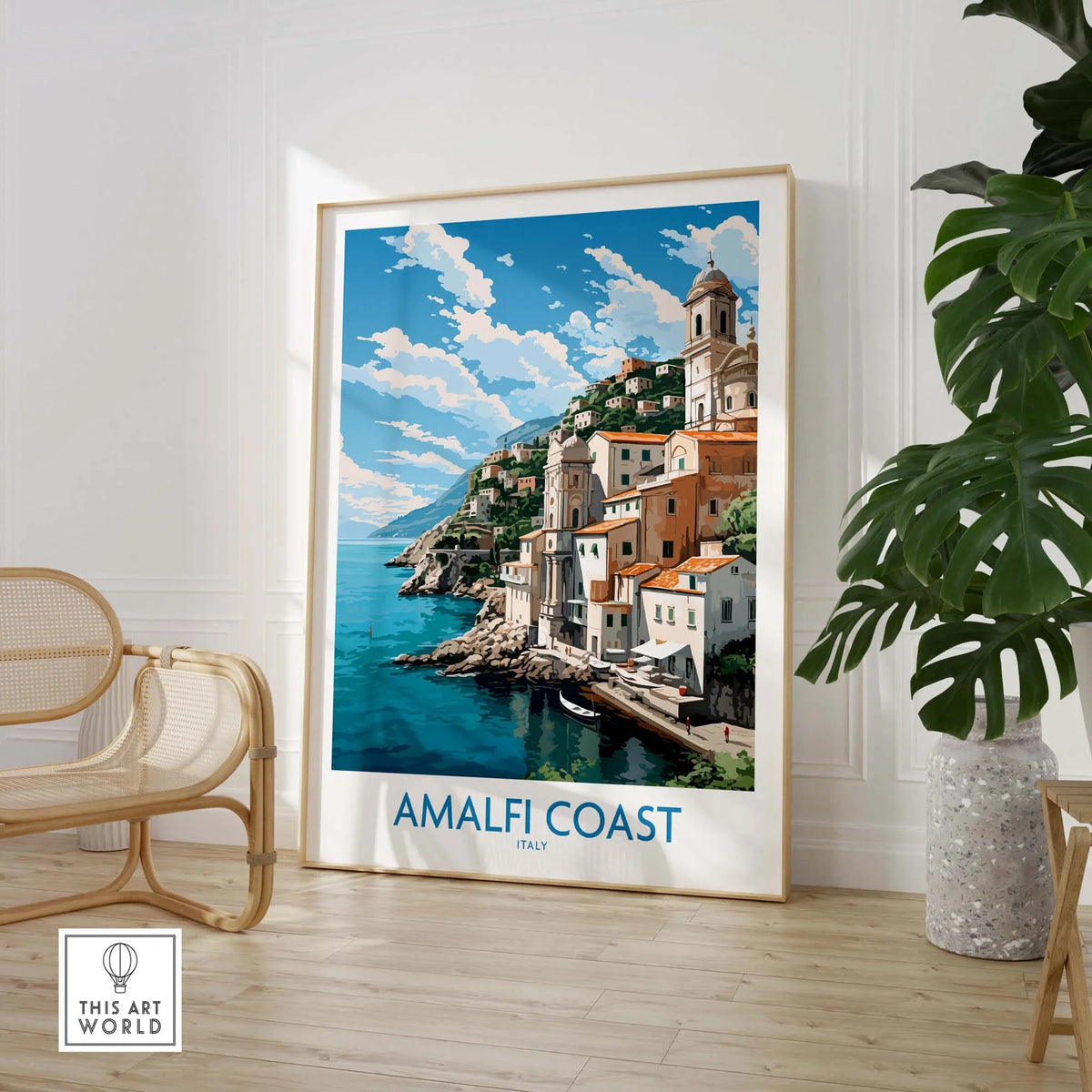 Amalfi Coast poster with pastel hues, showcasing the Italian Riviera, framed in a modern interior setting.