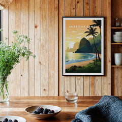 Framed American Samoa National Park travel poster in a rustic kitchen with wood panel walls.