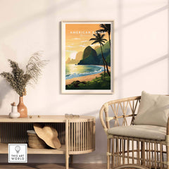 American Samoa National Park art print with palm trees, tropical beach, and ocean at sunset on a modern living room wall.