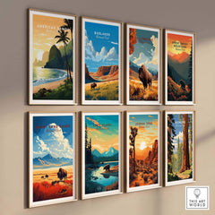 Gallery wall of colorful national park travel posters featuring scenic landscapes.