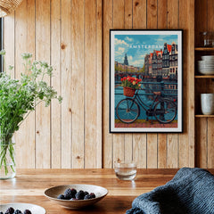 Poster of Amsterdam featuring a bike with tulips against a canal backdrop, capturing the city's charming essence.