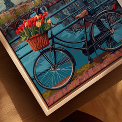 Poster of Amsterdam featuring a bike with tulips beside a canal.