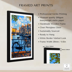 Colourful Amsterdam Architecture Poster - Iconic Canal Houses and Canals Wall Art displayed in a framed print with bike and canal scene.