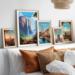 Stunning Angel Falls poster framed with other vibrant city art prints, enhancing a cozy home decor setup.