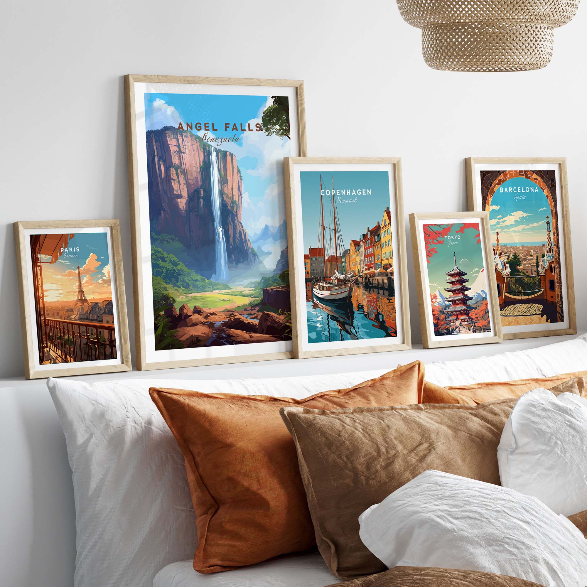 Stunning Angel Falls poster framed with other vibrant city art prints, enhancing a cozy home decor setup.