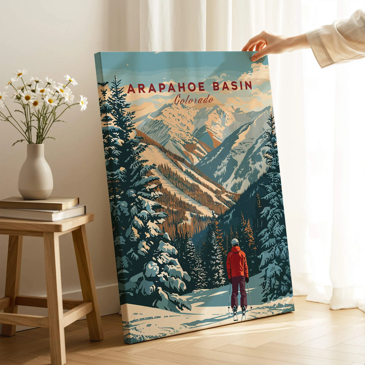 Arapahoe Basin Wall Art featuring snowy mountains and a skier, capturing the beauty of Colorado's landscapes.