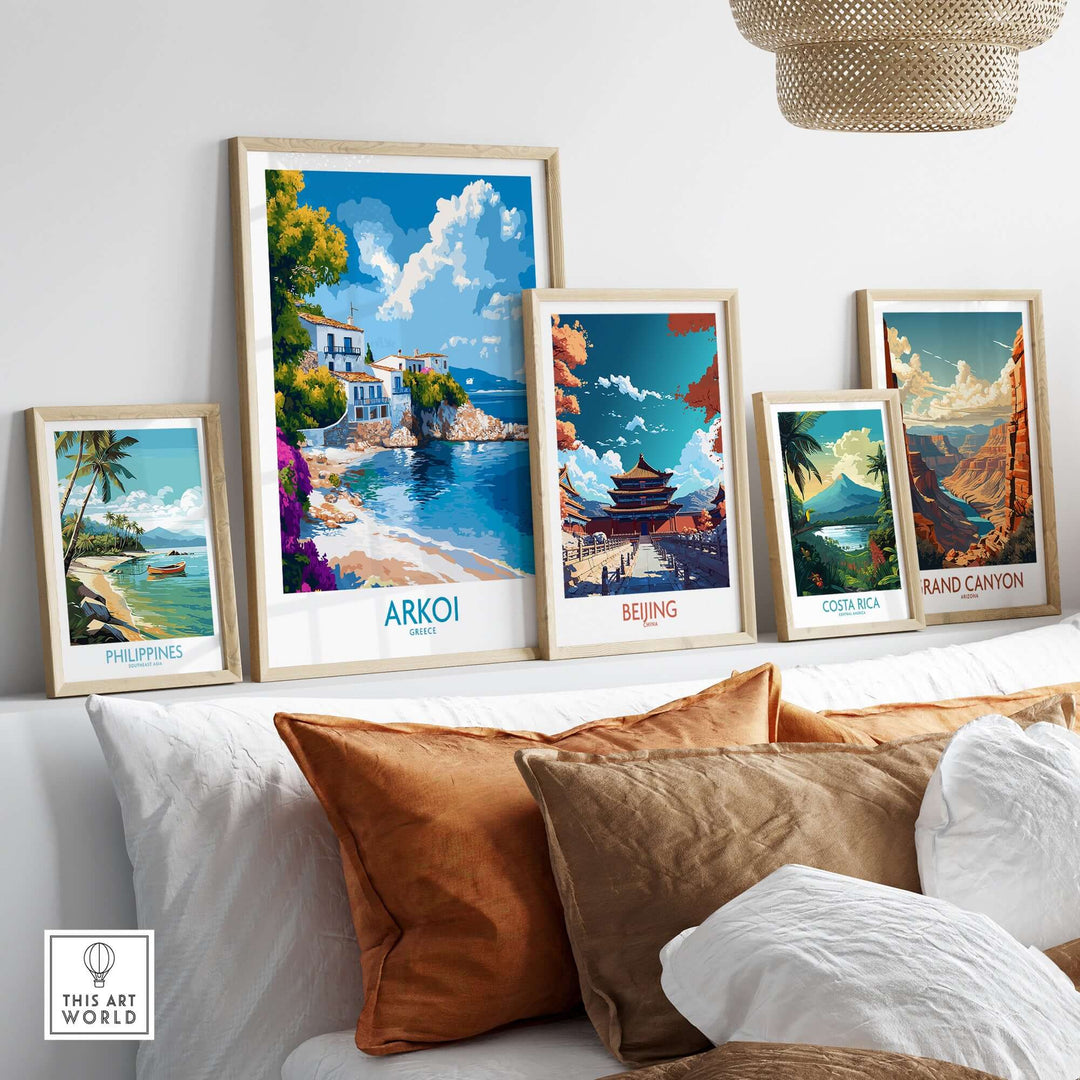 Collection of travel posters including Arkoi, Philippines, Beijing, Costa Rica, and Grand Canyon displayed on a cozy couch.