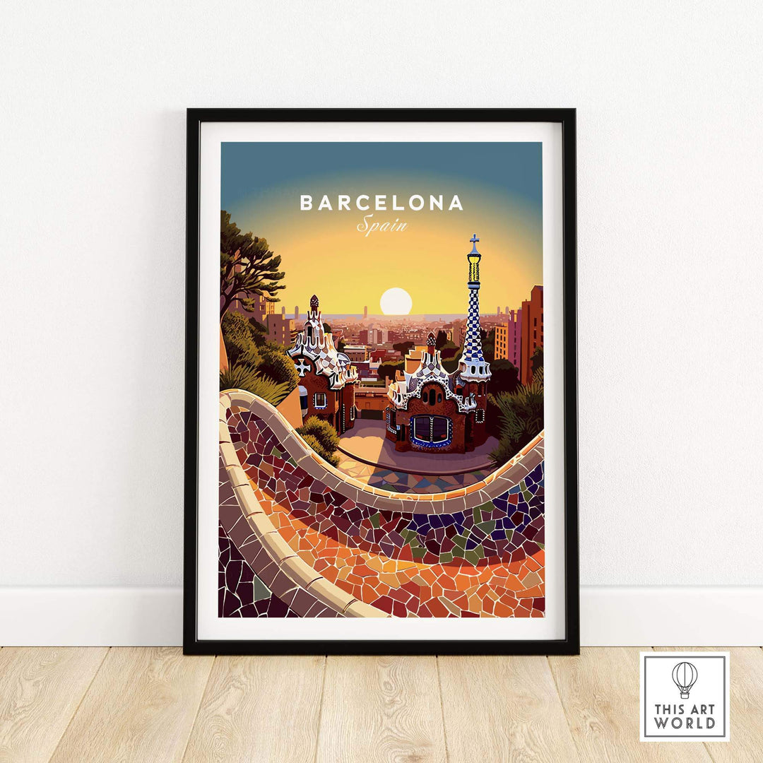 Barcelona at sunset view from Park Güell with beautiful Gaudi tiles and iconic landmarks in the distance. This art print is shown in a black frame on a wooden floor. 