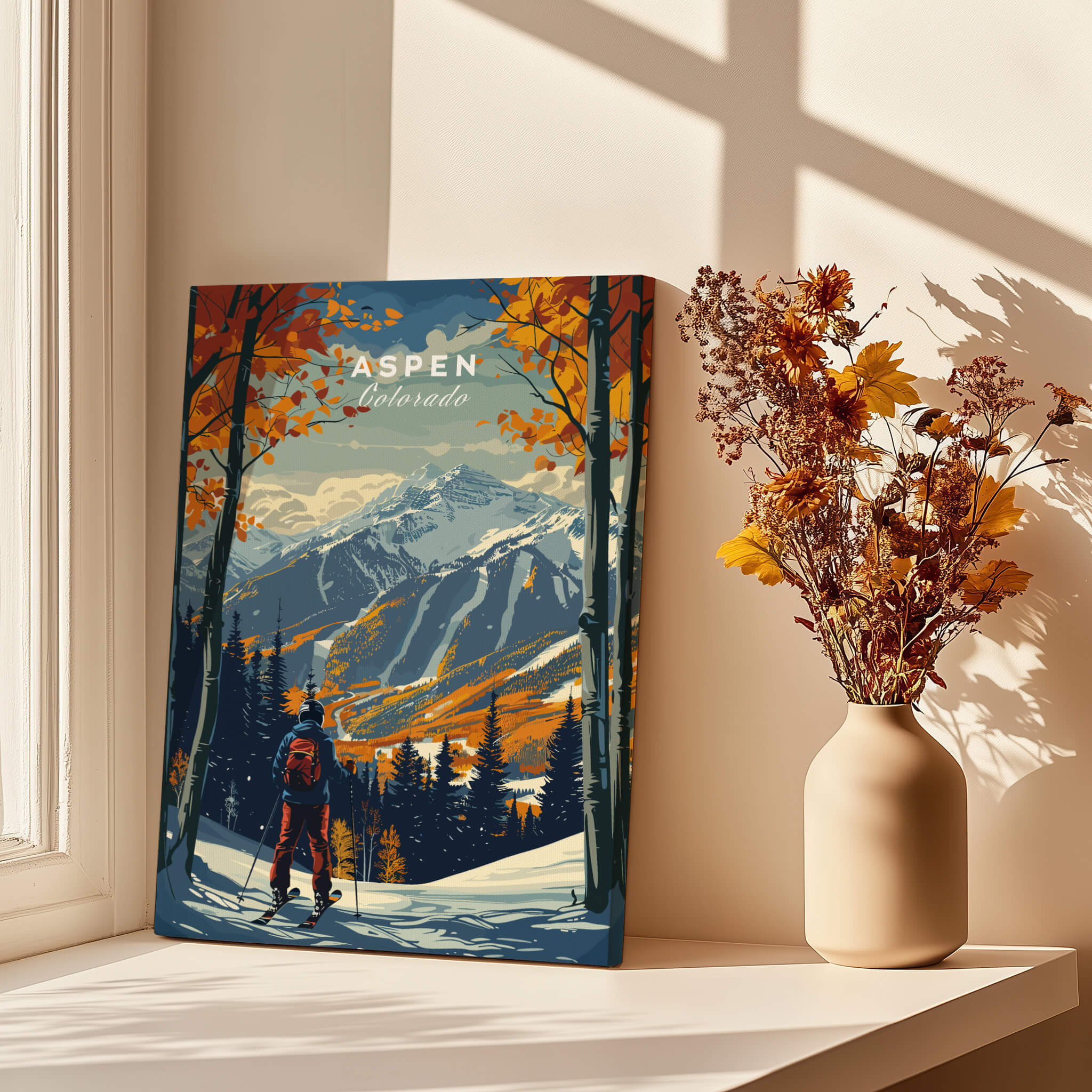 Aspen Print Ski Poster in a beautifully lit room with a vase of dried flowers and a view of majestic mountains.
