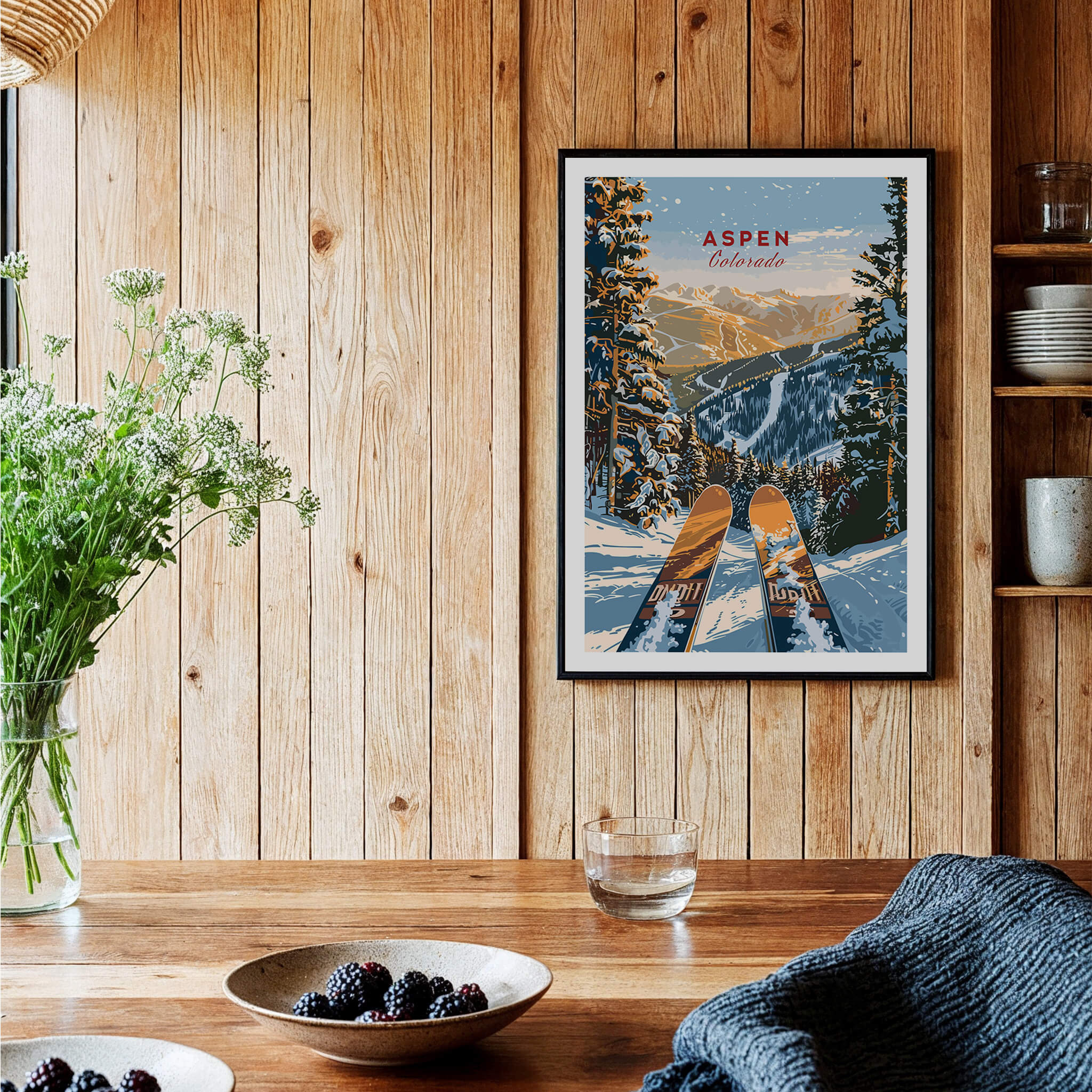 Aspen Print Colorado ski poster hanging on wooden wall with natural decor and scenic mountain view.