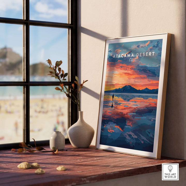 Atacama Desert wall art poster at sunset displayed on a wooden table by a window with beach view, enhancing home decor.