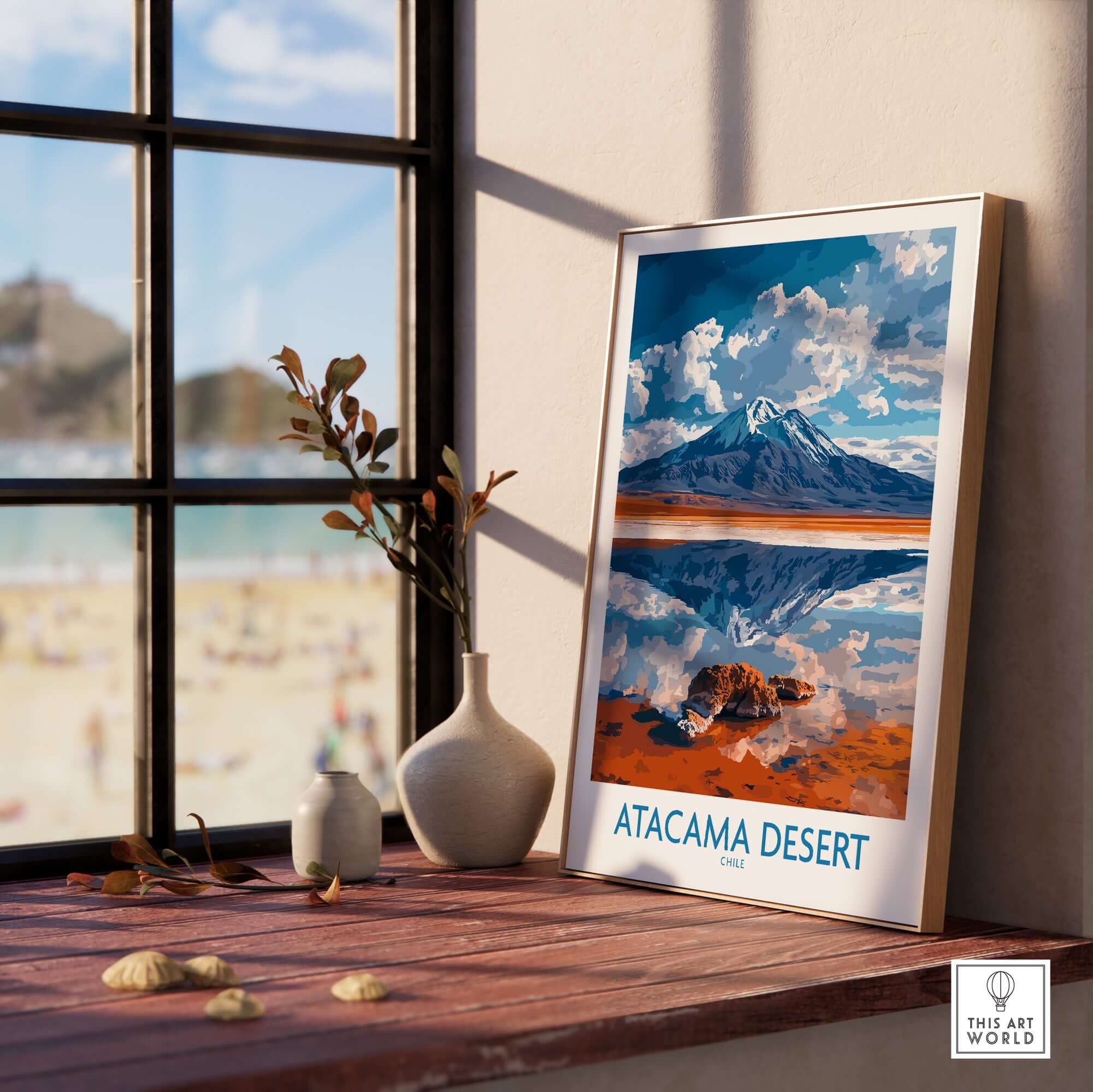 Atacama Desert Wall Art Print - Modern displayed on a wooden table near a window with beach view.