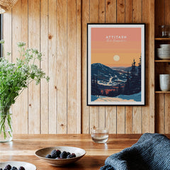 Attitash Print New Hampshire displayed in a rustic home setting with wooden walls and a mountain landscape.