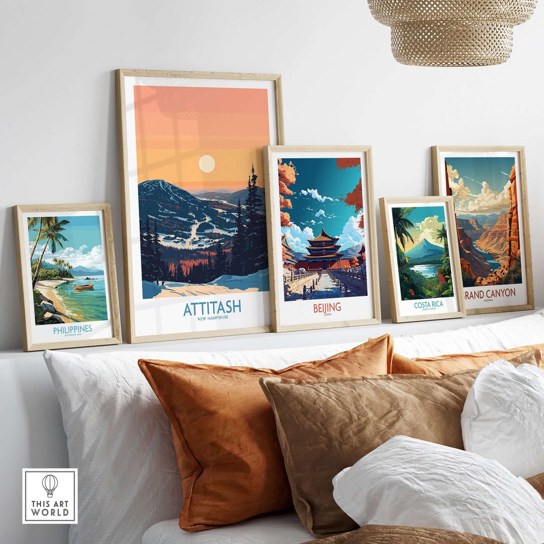 Display of framed travel posters including Attitash, Beijing, Costa Rica, and the Grand Canyon on a stylish wall.