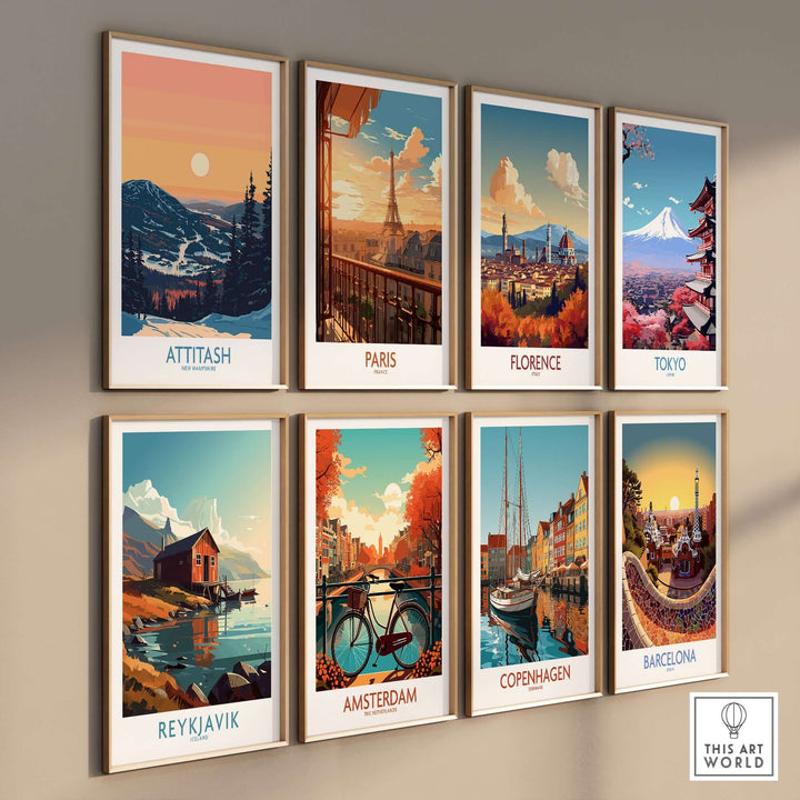 A collection of framed travel posters featuring Attitash, Paris, Florence, Tokyo, Reykjavik, Amsterdam, Copenhagen, and Barcelona.