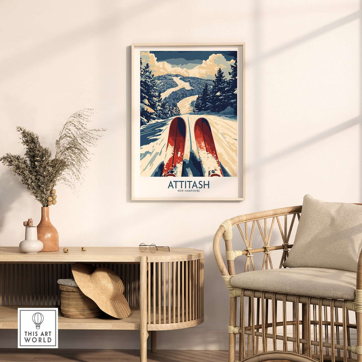 Attitash Ski Poster framed on a wall above a cozy chair, showcasing a winter landscape with skis on snow.