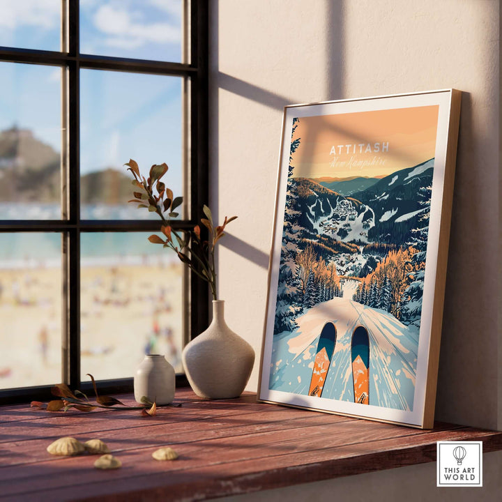 Attitash Ski Wall Art Poster displayed on a table, showcasing beautiful winter scenery and ski slopes in a sunny room.