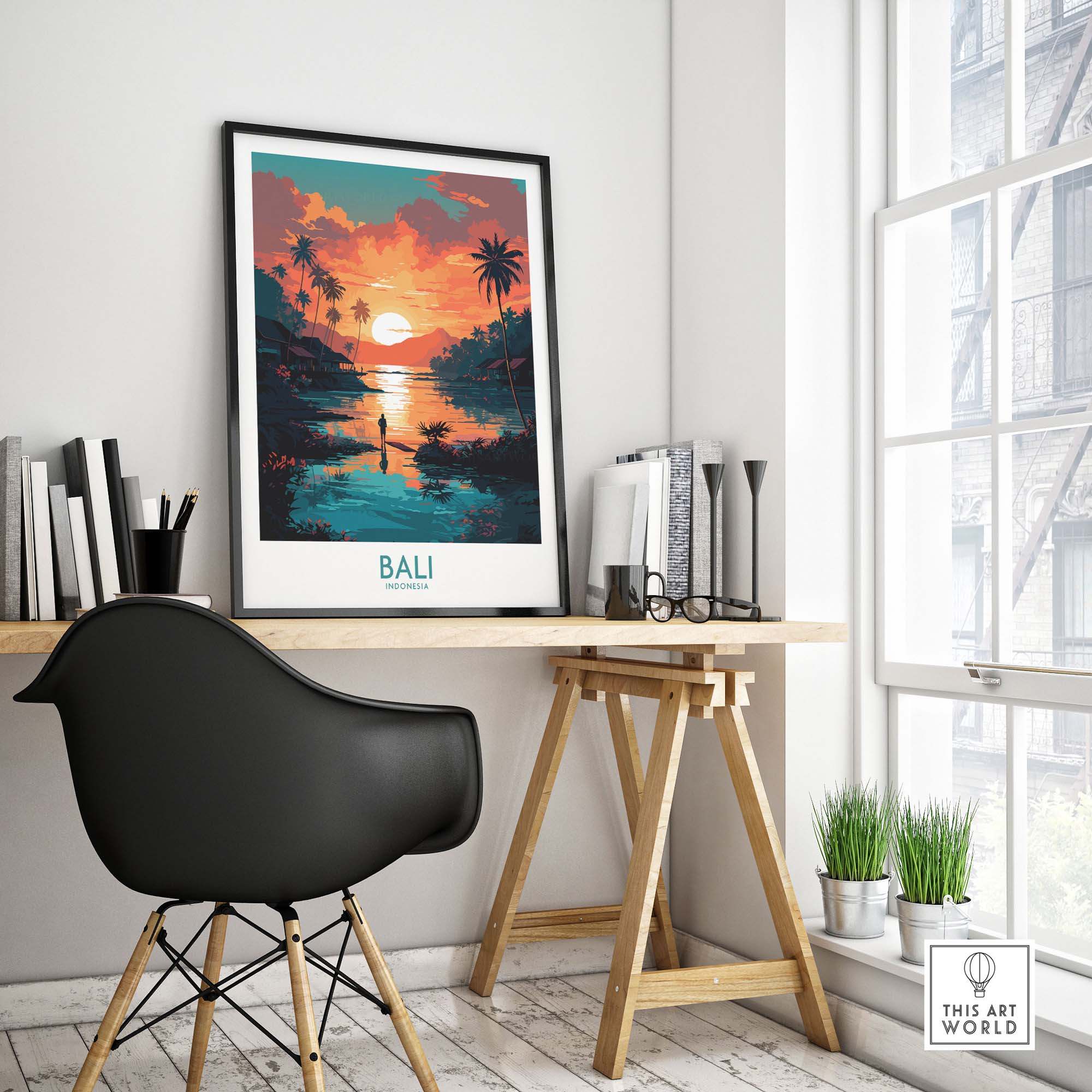 Bali wall art print displayed in a modern home office, featuring a vibrant sunset and lush palm trees.