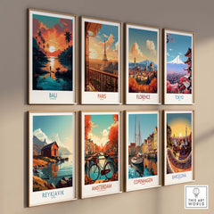Collection of framed modern travel art prints featuring Bali, Paris, Florence, Tokyo, Reykjavik, Amsterdam, Copenhagen, and Barcelona.