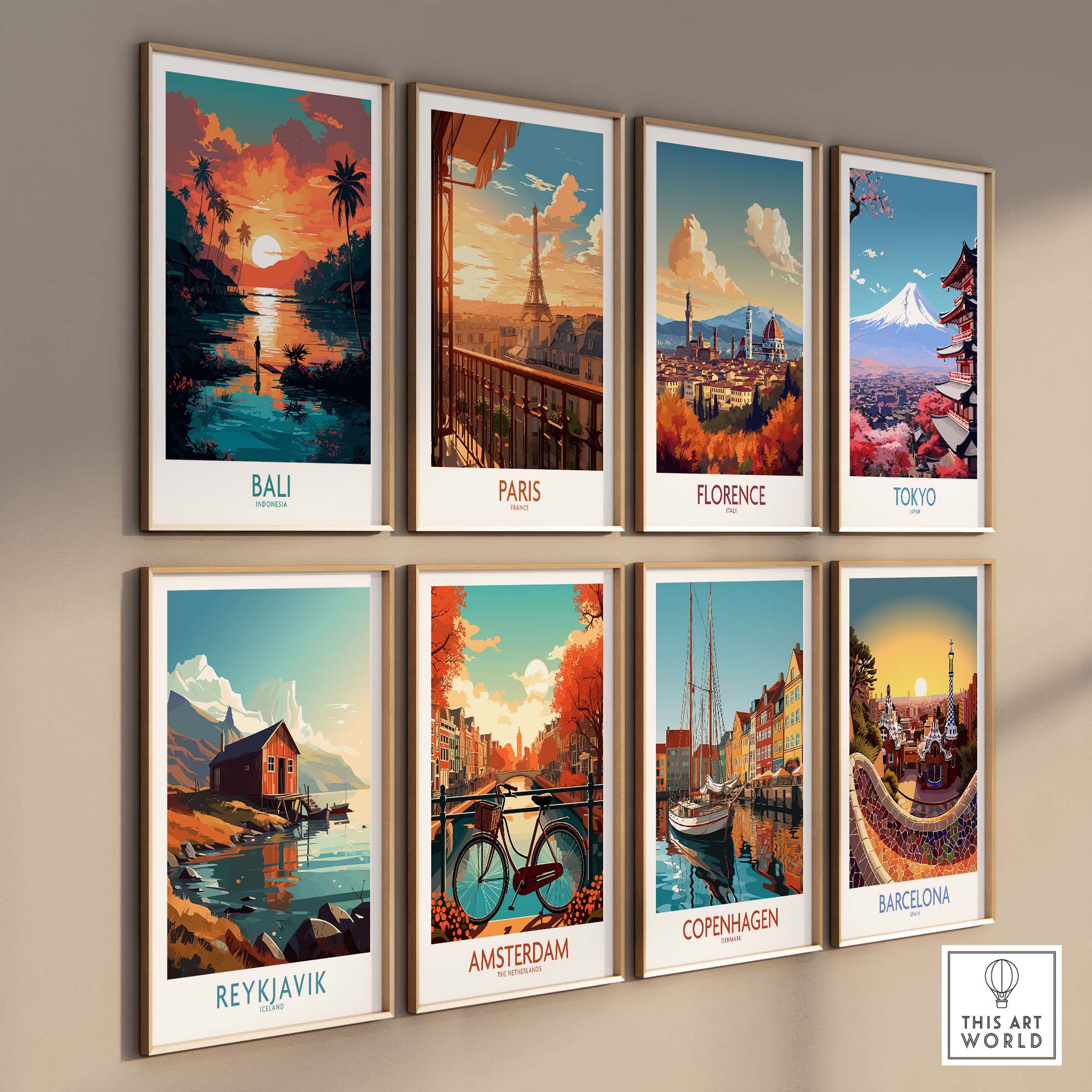 Collection of framed modern travel art prints featuring Bali, Paris, Florence, Tokyo, Reykjavik, Amsterdam, Copenhagen, and Barcelona.
