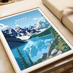 Banff National Park art print with mountains, lake, and trees in a natural wood frame, unwrapped.