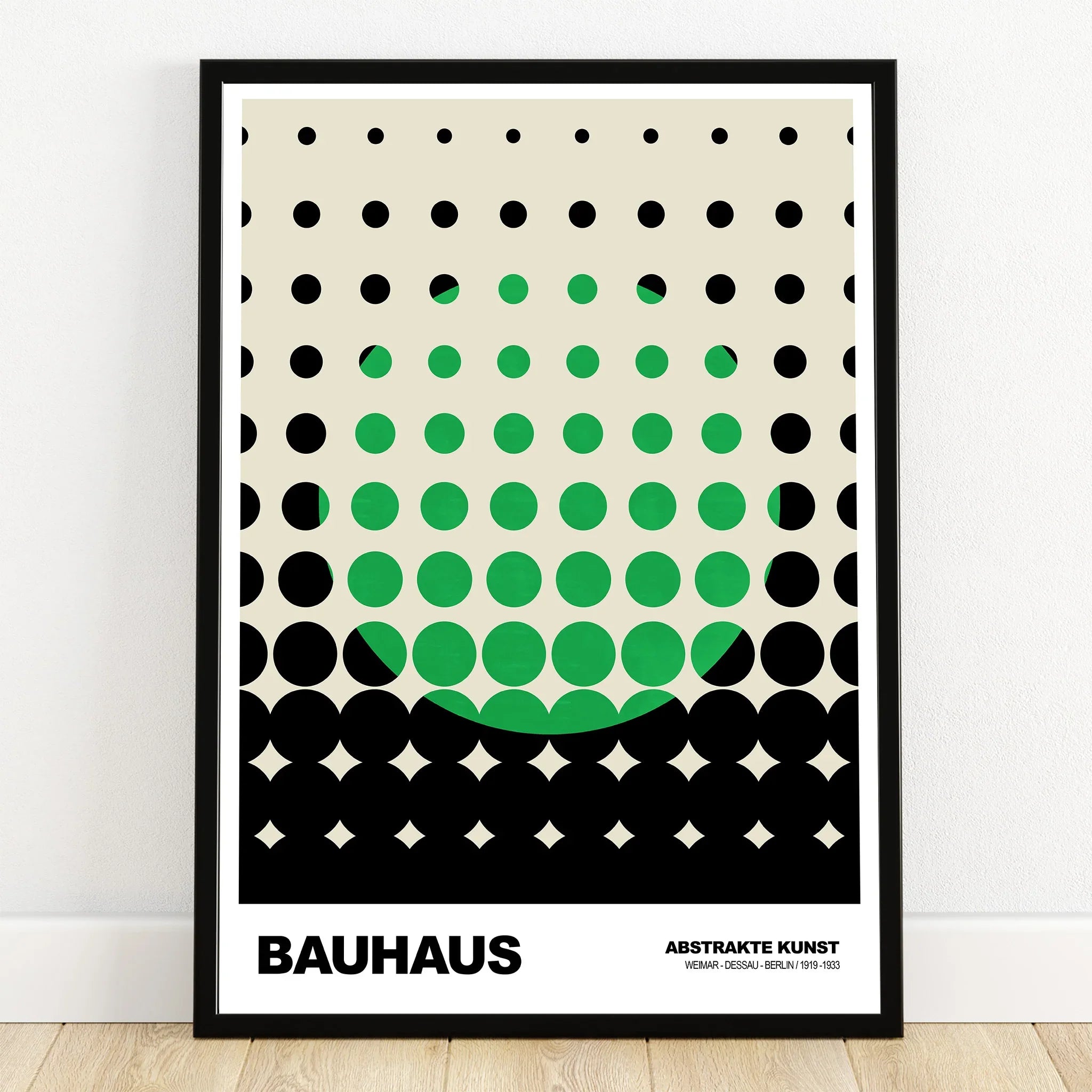 Bauhaus abstract art print with green and black geometric dots in a black frame