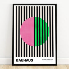 Bauhaus abstract art print with black stripes, pink and green circle in black frame