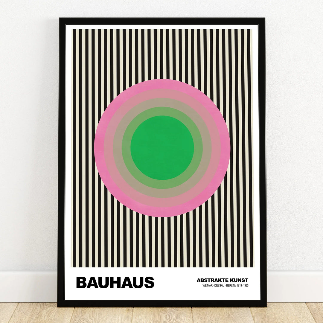 Bauhaus abstract art print with bold green and pink concentric circles on black and white stripes
