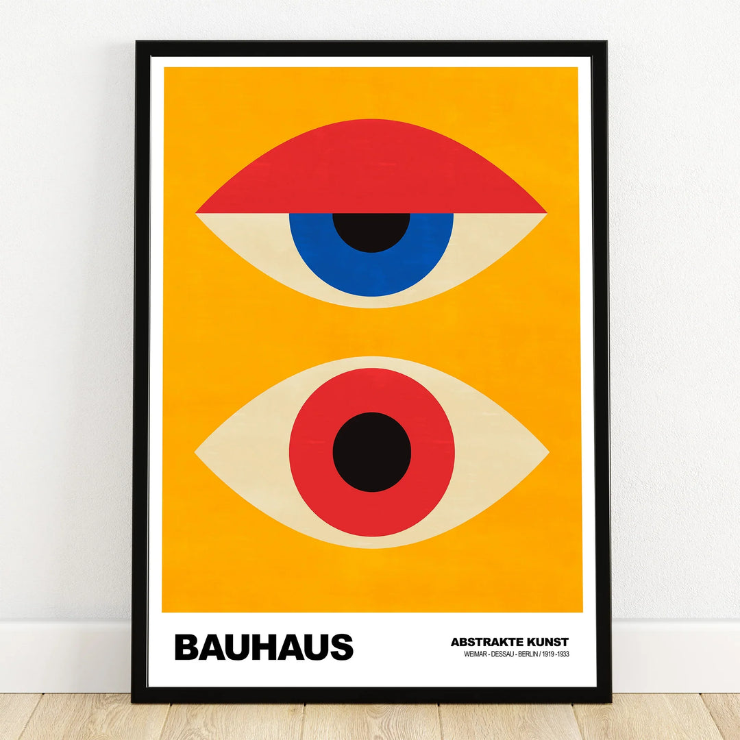 Bauhaus abstract wall art print with geometric eye shapes on yellow background in black frame