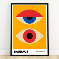 Bauhaus abstract wall art print with geometric eye shapes on yellow background in black frame