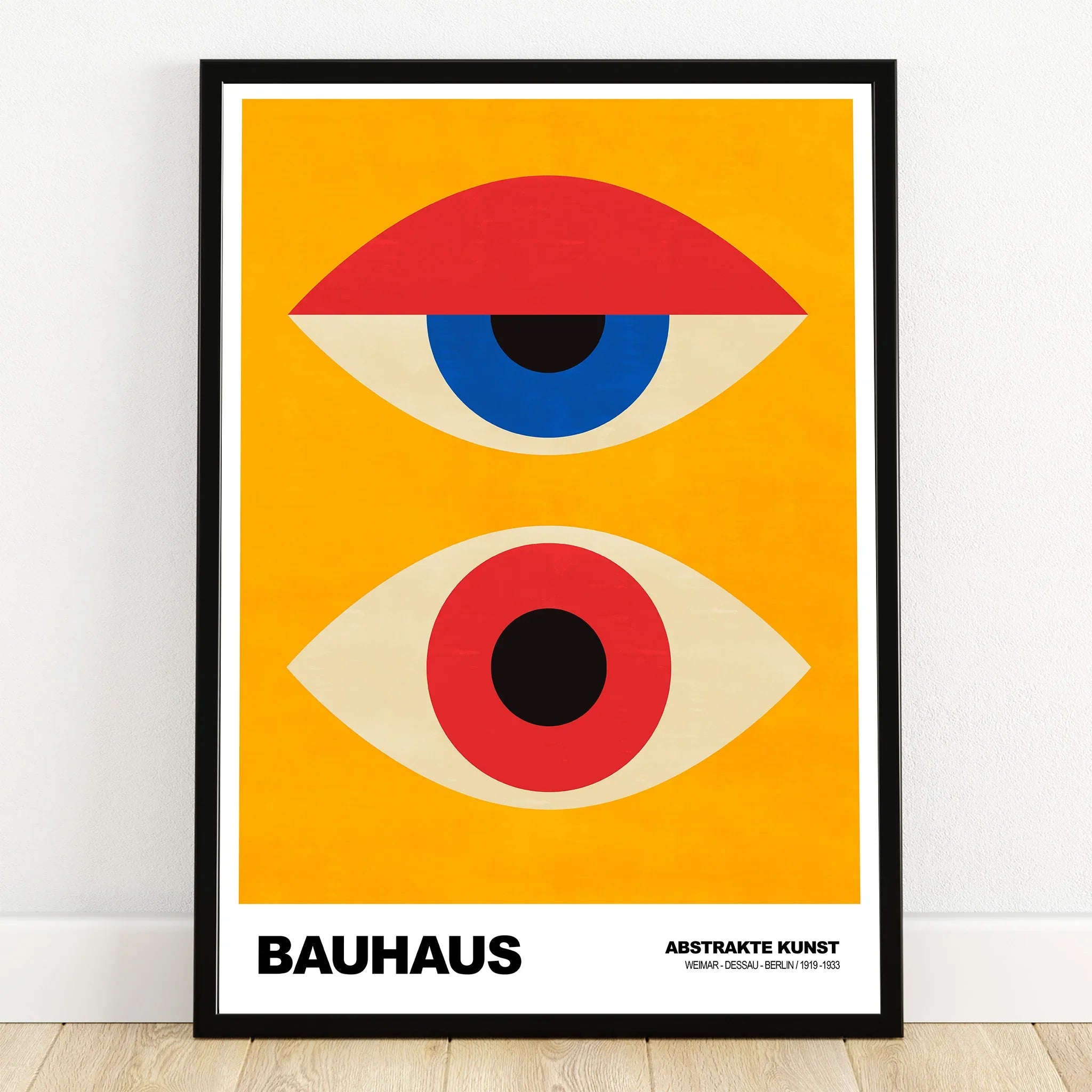 Bauhaus abstract wall art print with geometric eye shapes on yellow background in black frame