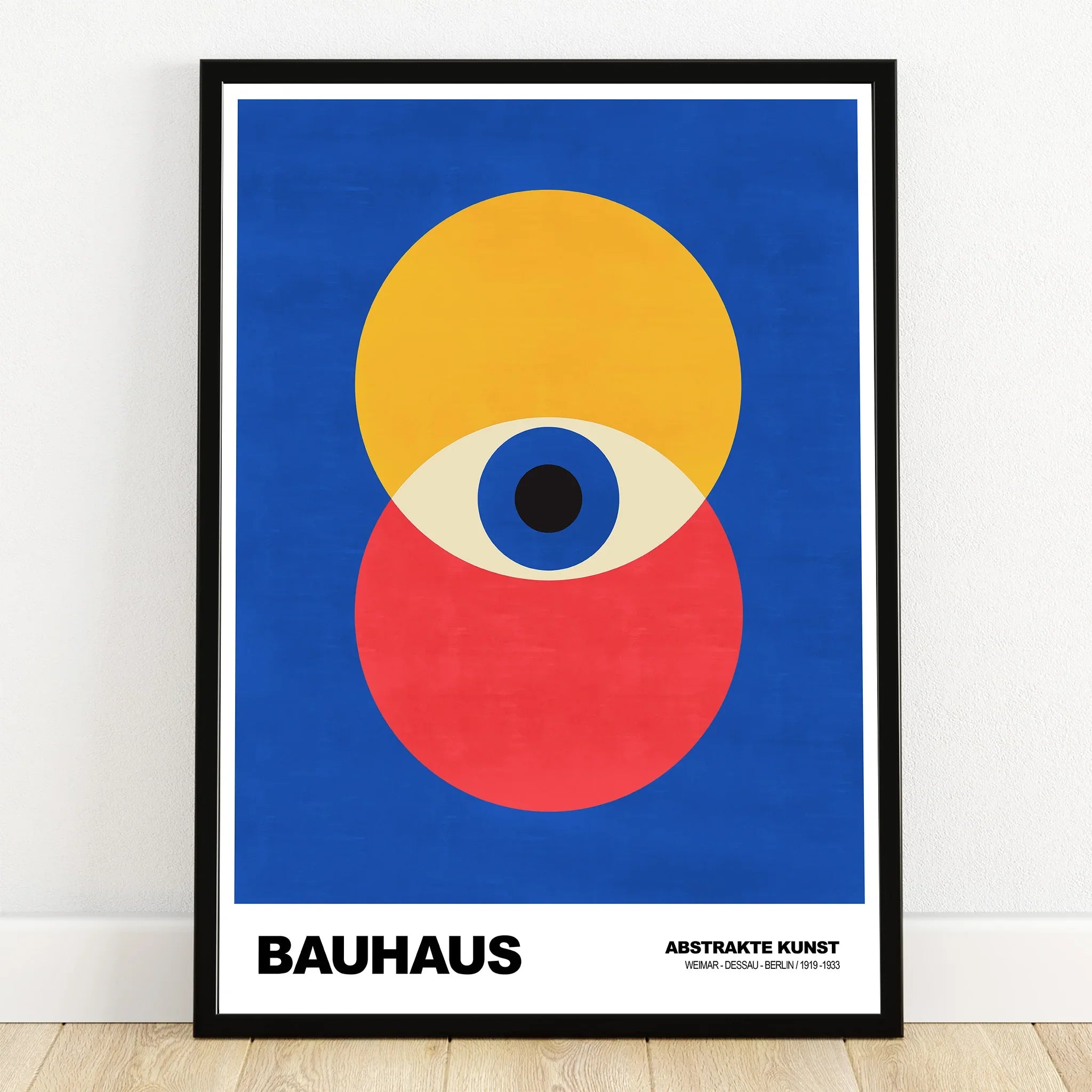 Modern Bauhaus abstract wall art print with yellow and red circles on blue background in black frame
