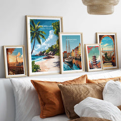 Beach Paradise Art - Seychelles Wall Poster collection displayed on a cozy sofa with decorative cushions.