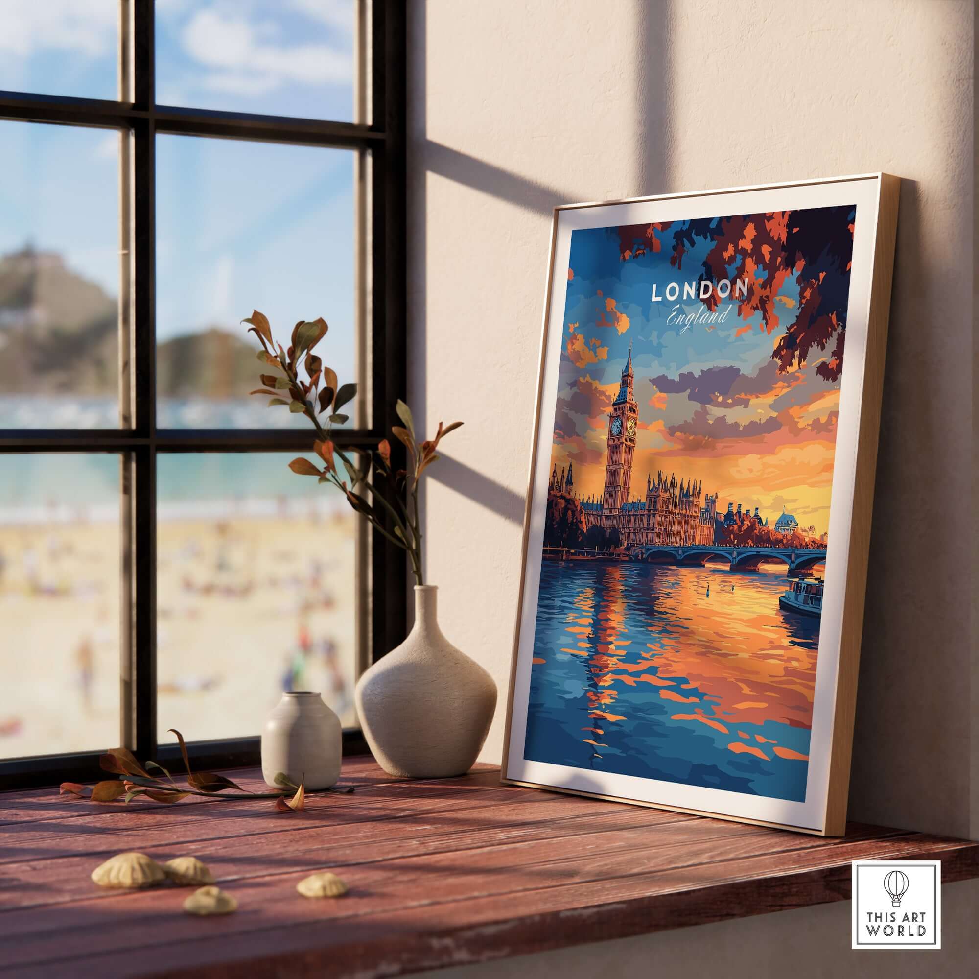 Big Ben London Art Print | Westminster Palace Poster displayed on a table near a sunny window with a beach view.