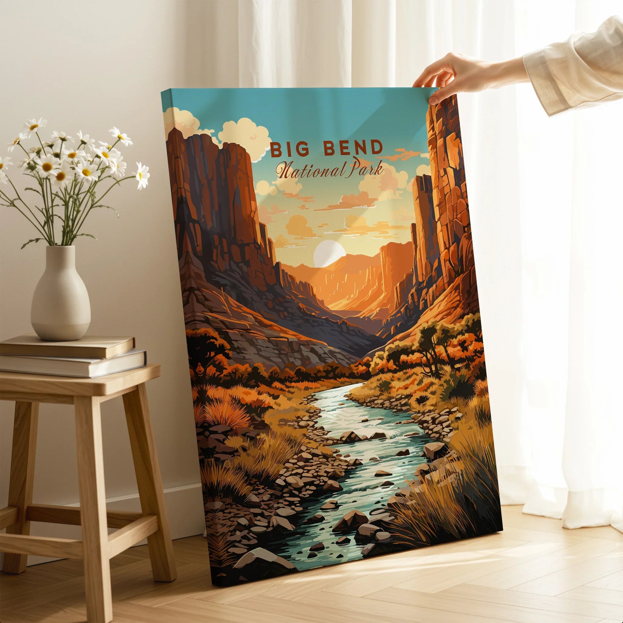 Person holding Big Bend National Park travel poster canvas print in modern room setting