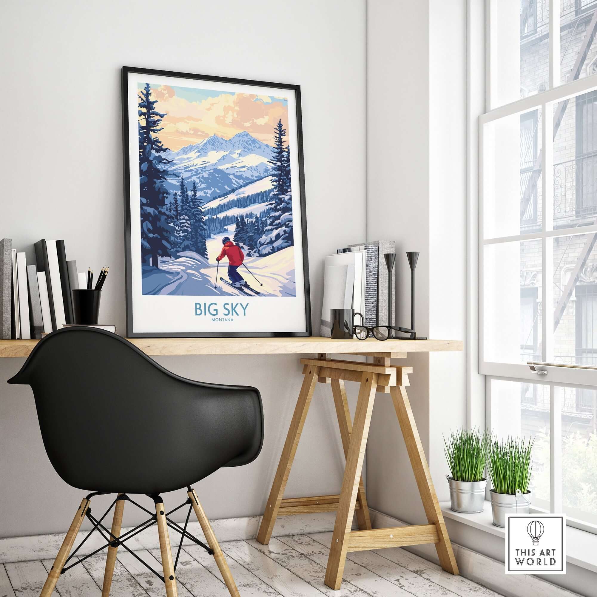 Big Sky Montana ski resort print framed in modern home office with snow-covered mountains in the background.