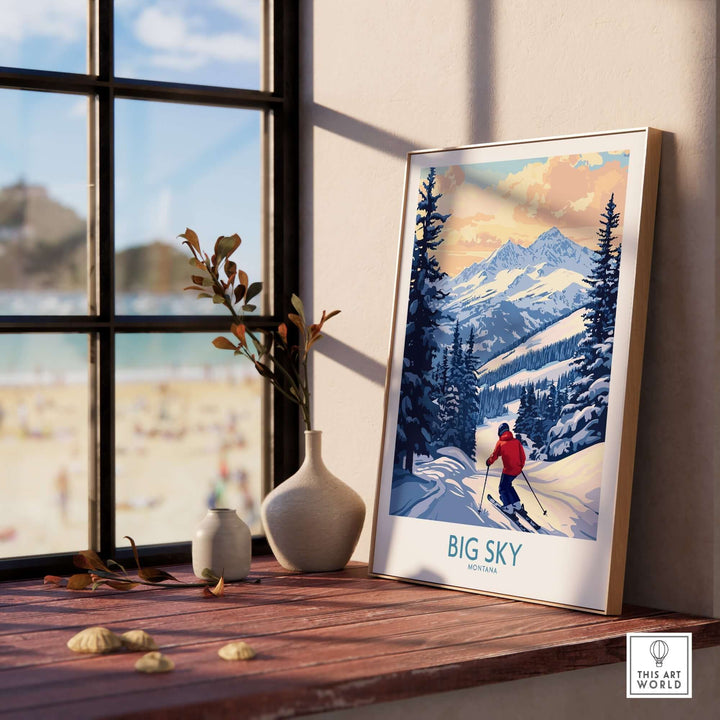 Framed Big Sky Montana print of skier on snowy slopes with mountains in the background, set in a sunlit room.