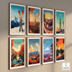 Colorful travel posters featuring Big Sky, Paris, Barcelona, London, Amsterdam, Florence, Tokyo, and Angkor Wat on a stylish wall.