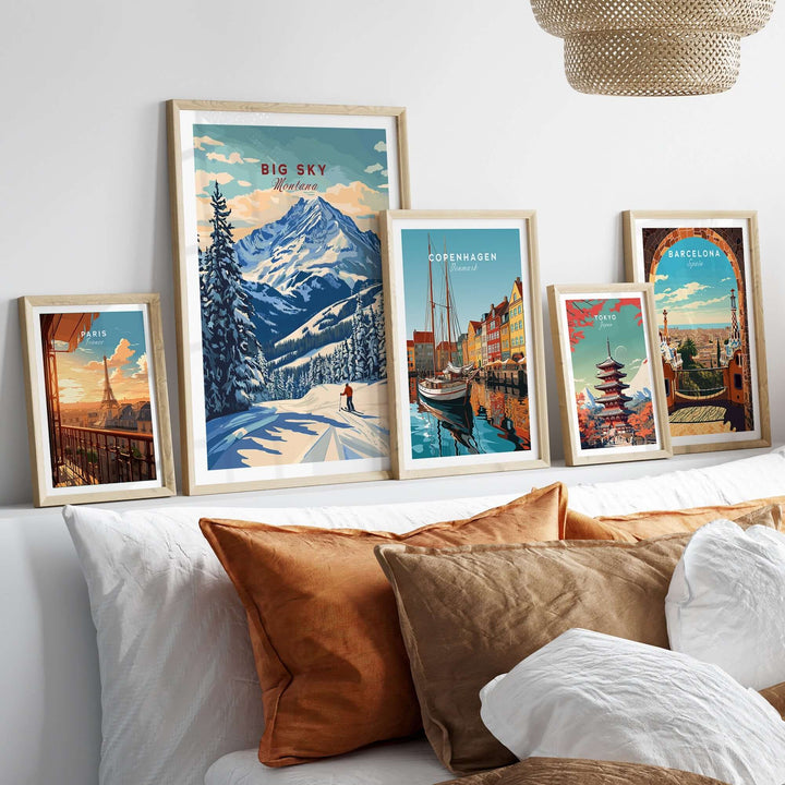 Beautiful Big Sky Wall Art displayed above a cozy bed, featuring scenic landscapes and cityscapes in stylish frames.