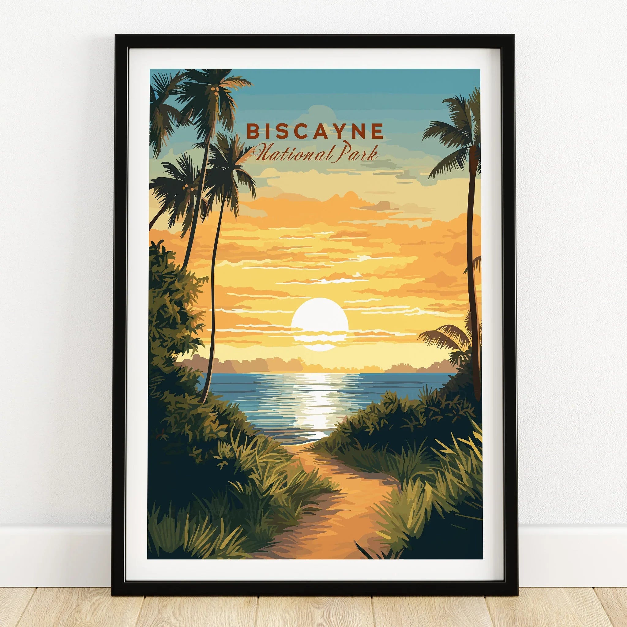 Framed Biscayne National Park art print with sunset, palm trees, and ocean view on wooden floor