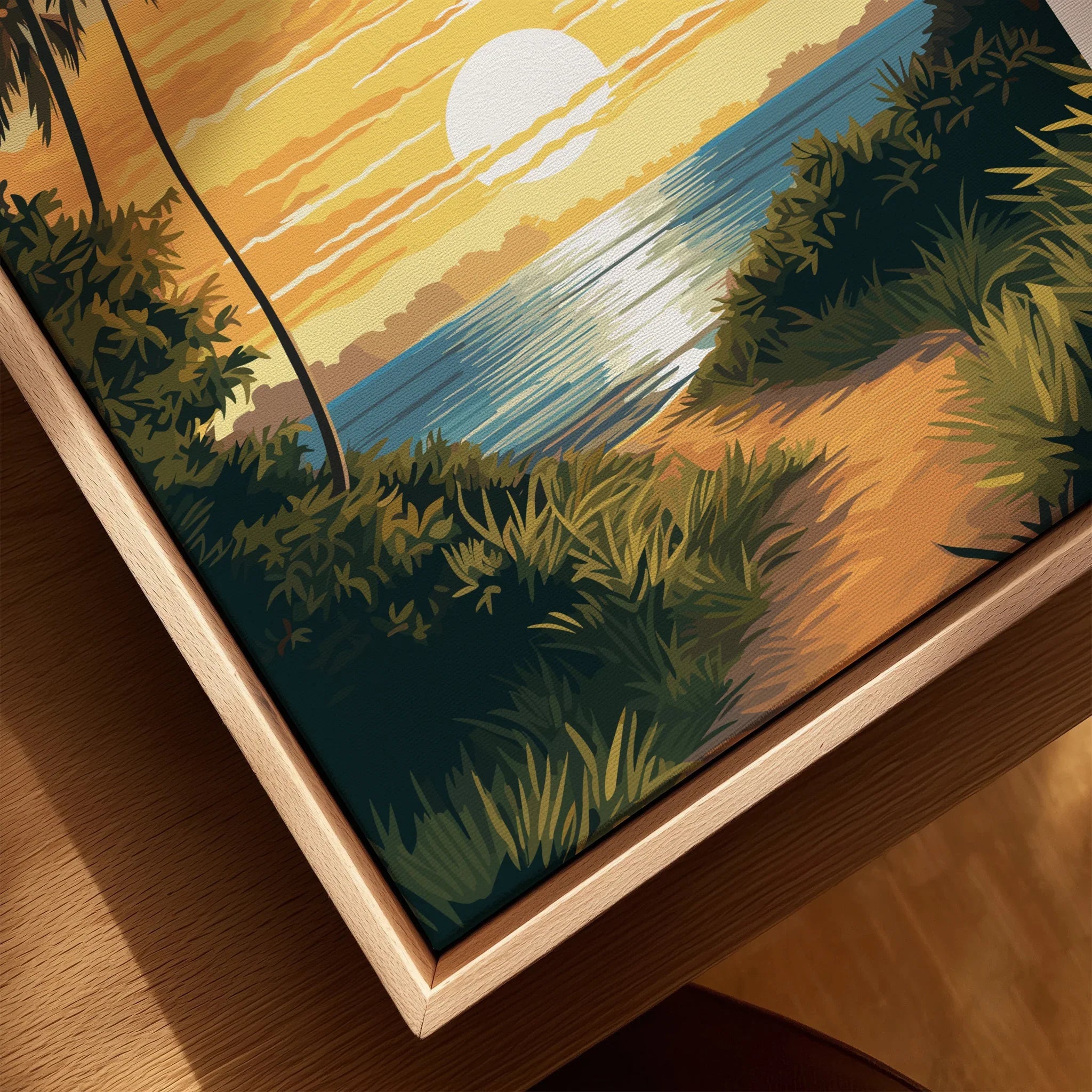 Framed canvas print of a coastal landscape with sunset, palm trees, and shoreline path