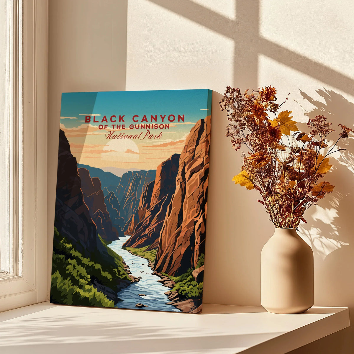 Black Canyon National Park print on canvas by a sunny window with vase of dried flowers