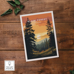 Black Forest print featuring a sunset over trees, perfect for travel decor and nature enthusiasts.